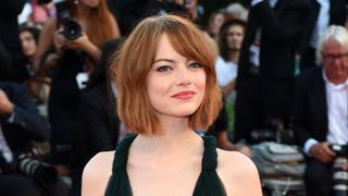emma stone on the red carpet with a bob hairstyle