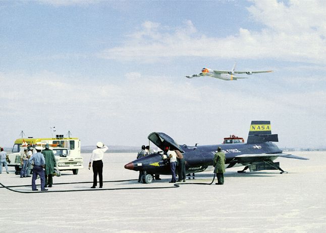 Space History Photo: X-15 on Lakebed with B-52 Mothership Flyover