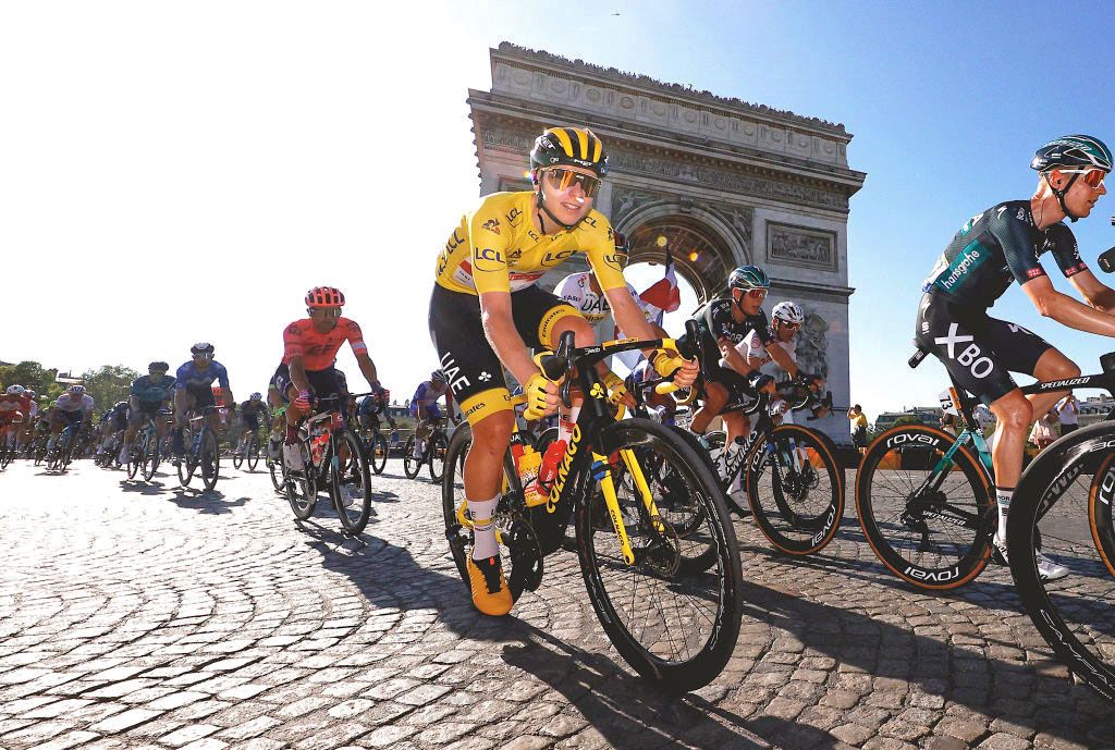 PARIS, FRANCE - JULY 18: Tadej PogaÄar of Slovenia and UAE-Team Emirates Yellow Leader Jersey during the 108th Tour de France 2021, Stage 21 a 108,4km stage from Chatou to Paris Champs-Ã‰lysÃ©es / Arc De Triomphe / Paris City / @LeTour / #TDF2021 / on July 18, 2021 in Paris, France. (Photo by Chris Graythen/Getty Images)