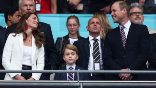 Catherine, Duchess of Cambridge, Prince George of Cambridge and Prince William, Duke of Cambridge and President of the Football Association look on during the UEFA Euro 2020 Championship Final between Italy and England at Wembley Stadium on July 11, 2021 in London, England.