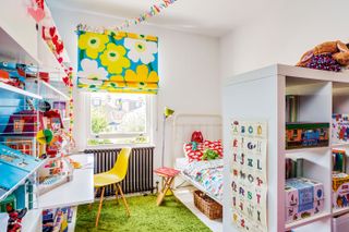 childrens bedroom with lots of bright colours and eye catching features photographed by Bruce Hemming
