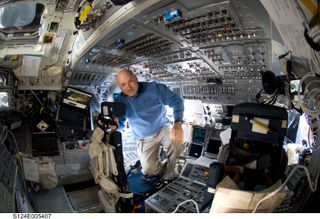 Mark Kelly aboard the space shuttle Discovery during the STS-124 mission in 2008.