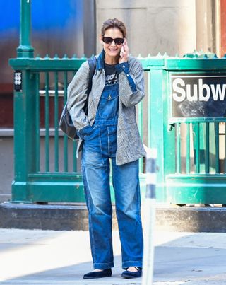 Katie Holmes in new york city wearing the summer overalls trend with mary janes