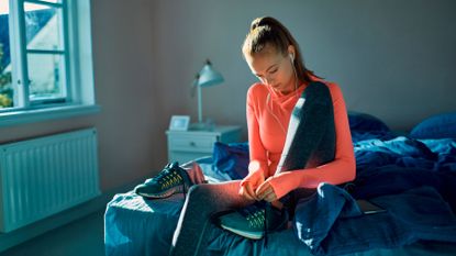 Woman gets ready for some morning exercise 