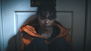 Whitney Peak against the door in Thrash 