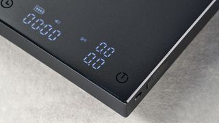 the Timemore Black Mirror Basic 2 coffee scale black compact premium coffee scale with a waterproof surface and rechargeable USB-C battery