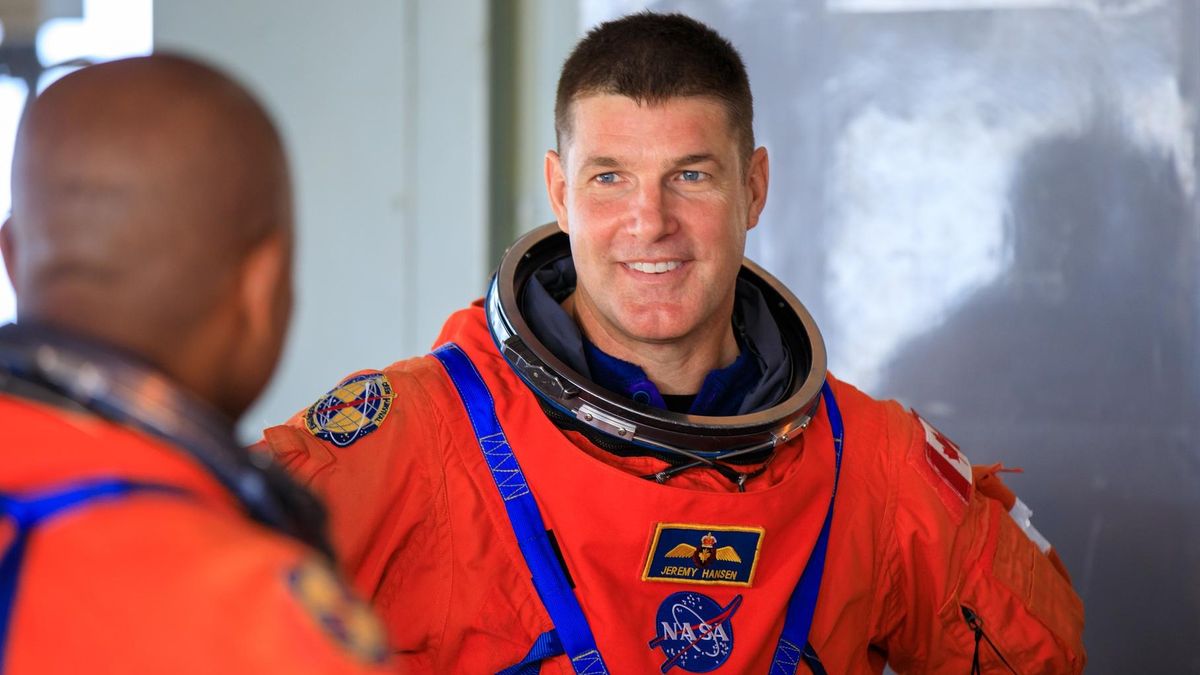 Artemis 2 moon astronaut Jeremy Hansen, with the Canadian Space Agency, faces crewmate and NASA astronaut Victor Glover (visible from back) during a launch simulation on Sept. 20, 2023 at NASA's Kennedy Space Center in Florida.