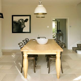 dining room with tiled flooring and table with chairs
