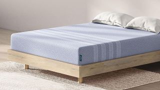 Best memory foam mattress: Leesa Studio placed on a wooden bedframe