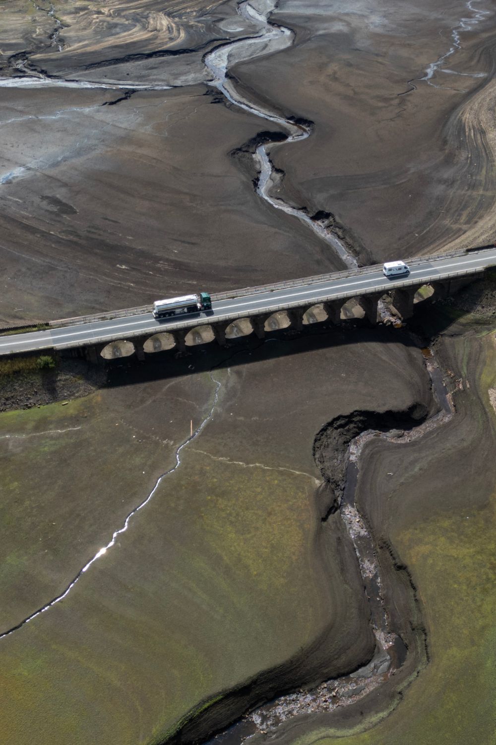 Low water levels at Woodhead Reservoir during England&amp;rsquo;s 2026 drought, amid growing concerns about AI water use.