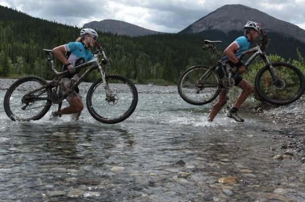 Jeff Neilson (f) and Mical Dyck lead the Open Mixed division after five stages.