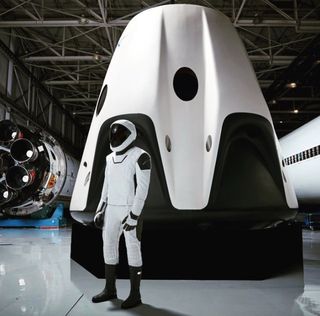 SpaceX founder and CEO Elon Musk posted this photo to Twitter, revealing the full head-to-toe design of the company's spacesuit that astronauts will wear aboard the Crew Dragon.