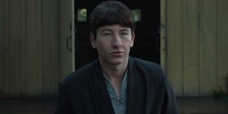 Barry Keoghan walking out of a shack in Marvel's Eternals.