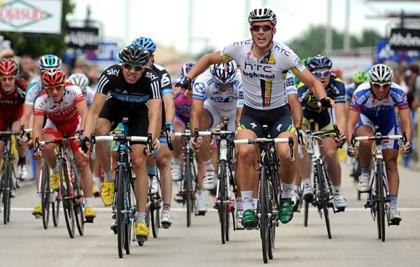 John Degenkolb (HTC-Highroad) raises his arms