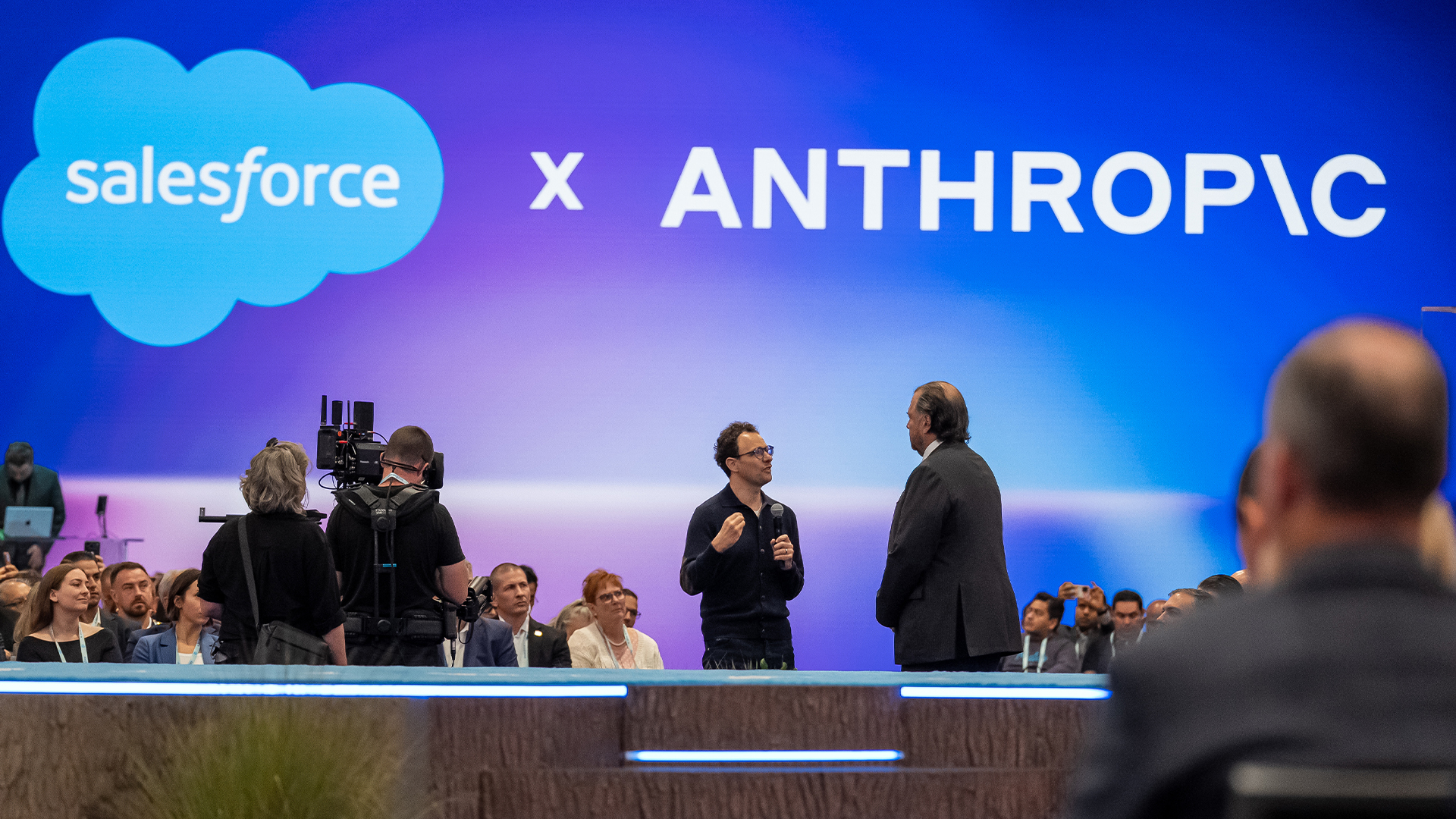 Anthropic CEO Dario Amodei pictured with Salesforce CEO Marc Benioff during a discussion on AI safety at Dreamforce 2026 in San Francisco, USA.