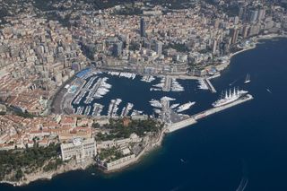 view of a marina and city