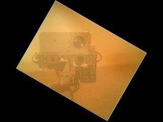 On Sol 32 (Sept. 7, 2012) the Curiosity rover used a camera located on its arm to obtain this self portrait. The image of the top of Curiosity's Remote Sensing Mast, showing the Mastcam and Chemcam cameras, was acquired by the Mars Hand Lens Imager (MAHLI).