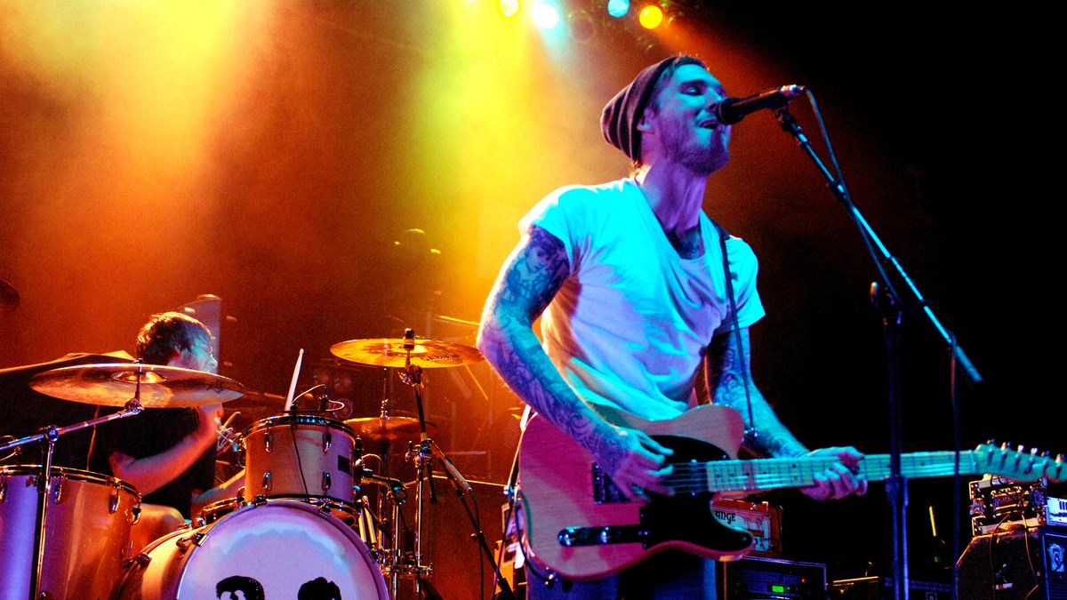  Brian Fallon (R) of Gaslight Anthem performs in support of The &#039;59 Sound release at the San Jose State Event Center on November 7, 2008 in San Jose, California.