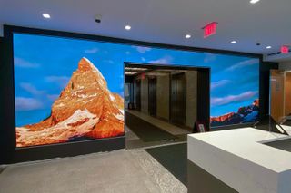 Two massive SNA Displays show an immersive mountain top on LED displays.