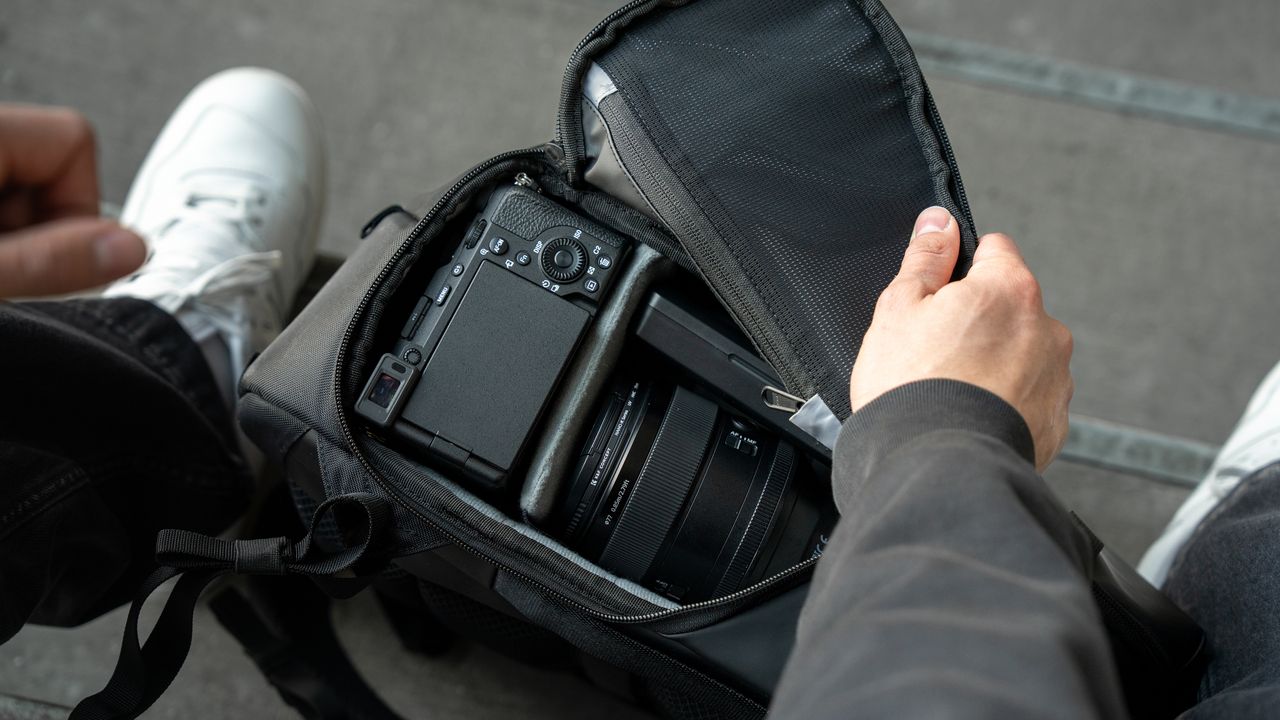 The Wandrd Stratus camera backpack with the side open