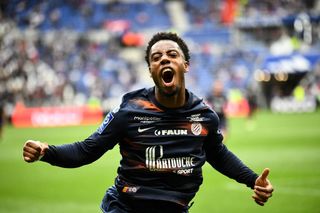 Montpellier's French forward Elye Wahi celebrates scoring his team's first goal during the French L1 football match between Olympique Lyonnais (OL) and Montpellier Herault SC at The Groupama Stadium in Decines-Charpieu, central-eastern France on May 7, 2023.