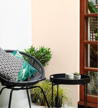 How to paint an exterior wall with neutral walls and table and chair