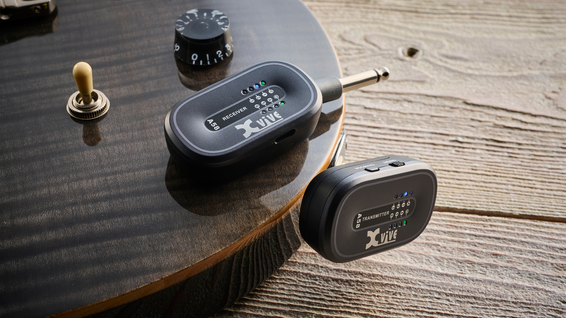 An XVive A58 wireless guitar system plugged into an electric guitar