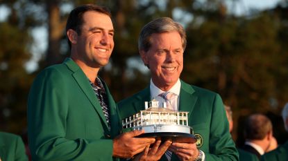 Scottie Scheffler and Fred Ridley at the prize ceremony at the 2022 Masters