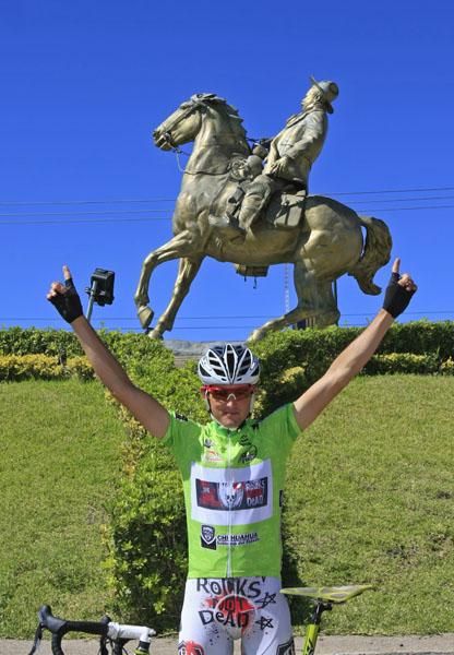 Oscar Sevilla (Rock Racing) celebrates in the leader's jersey with just one stage remaining.