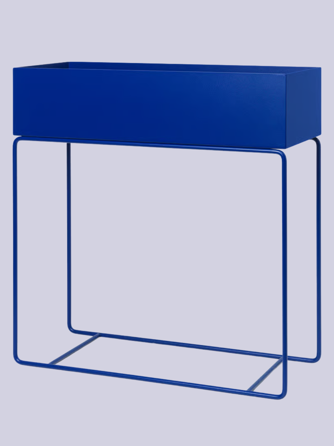 A bright blue plant box from Ferm Living