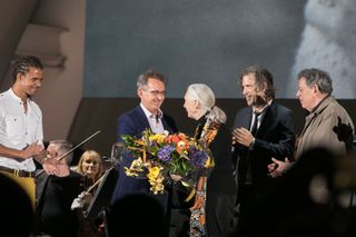 Jane Goodall at the premier of "Jane" at the Hollywood Bowl on Oct. 9, 2017. From left, Goodall's grandson, Merlin van Lawick; her son, Hugo "Grub" van Lawick; the film's director, Brett Morgen; and the film's composer, Philip Glass.