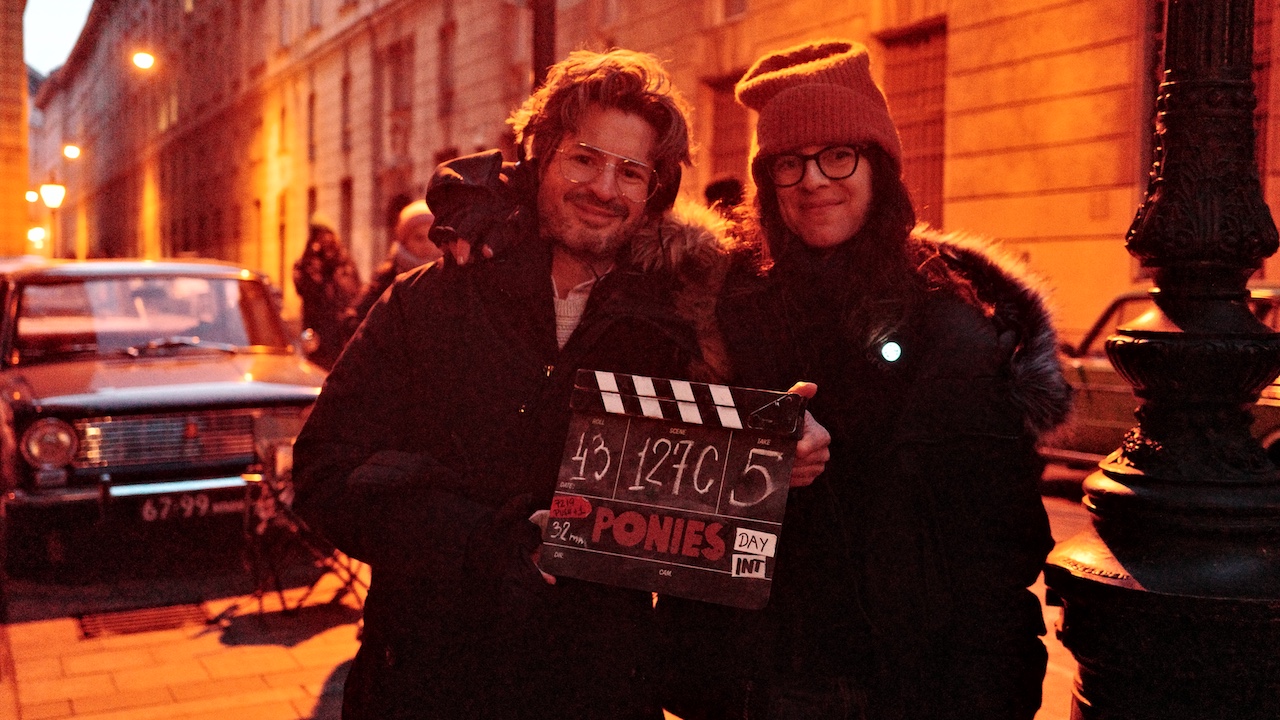 Ponies creators David Iserson and Susanna Fogel on set