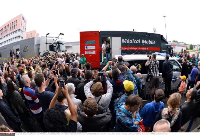 The crowds gather to see how Froome is post-crash