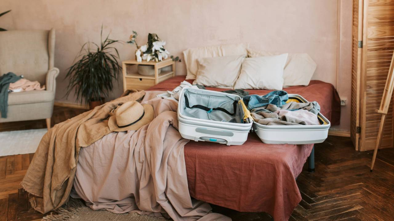 Suitcase on bed