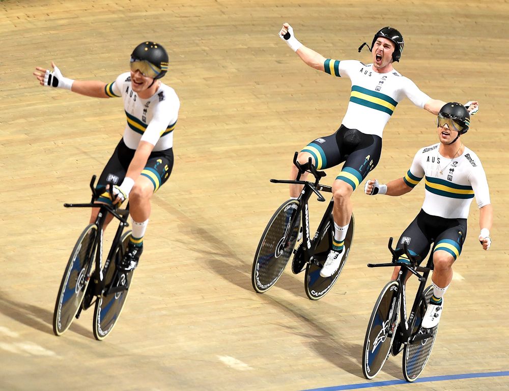 Australia's team celebrates after breaking the team persuit world record during the UCI Track Cycling World Championships on February 27, 2019 in Pruszkow.