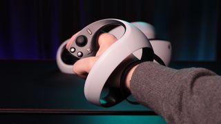 PSVR 2 Review Image showing the VR2 Sense controller in the hand