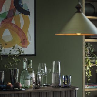 bar on sideboard with pendant light