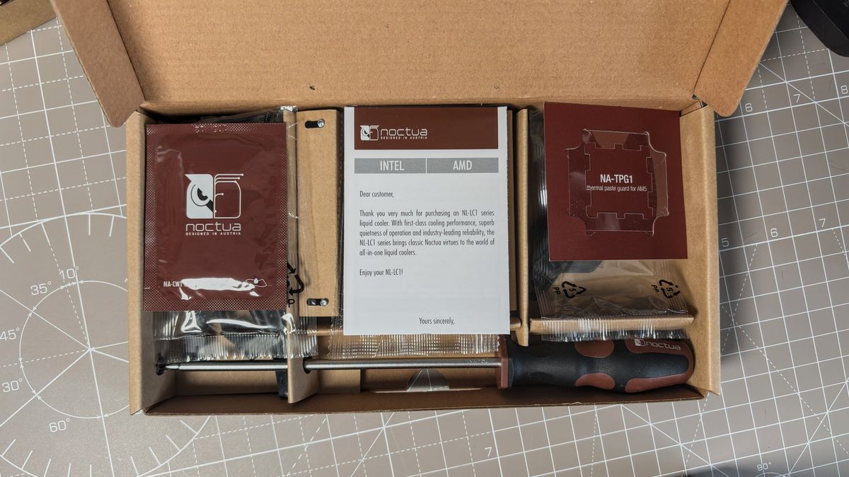 A Noctua NL-LC1 liquid cooler being installed on a test bench for testing.