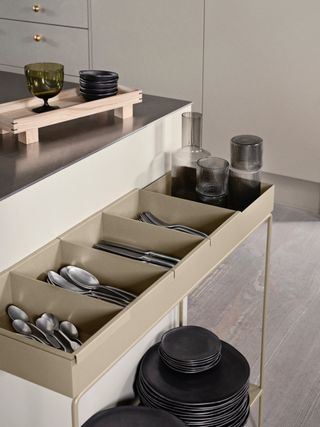 A cutlery stand in a kitchen
