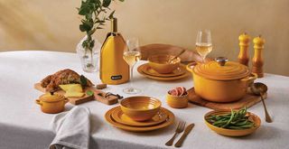 Table with new Le Creuset colour Nectar yellow cookware and accessories