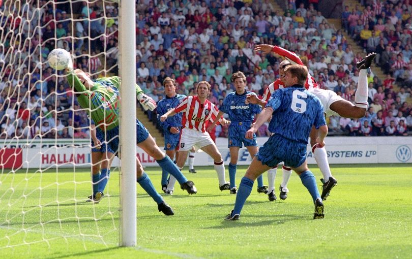 Brian Deane scoring past Peter Schmeichel, Sheffield United v Manchester United