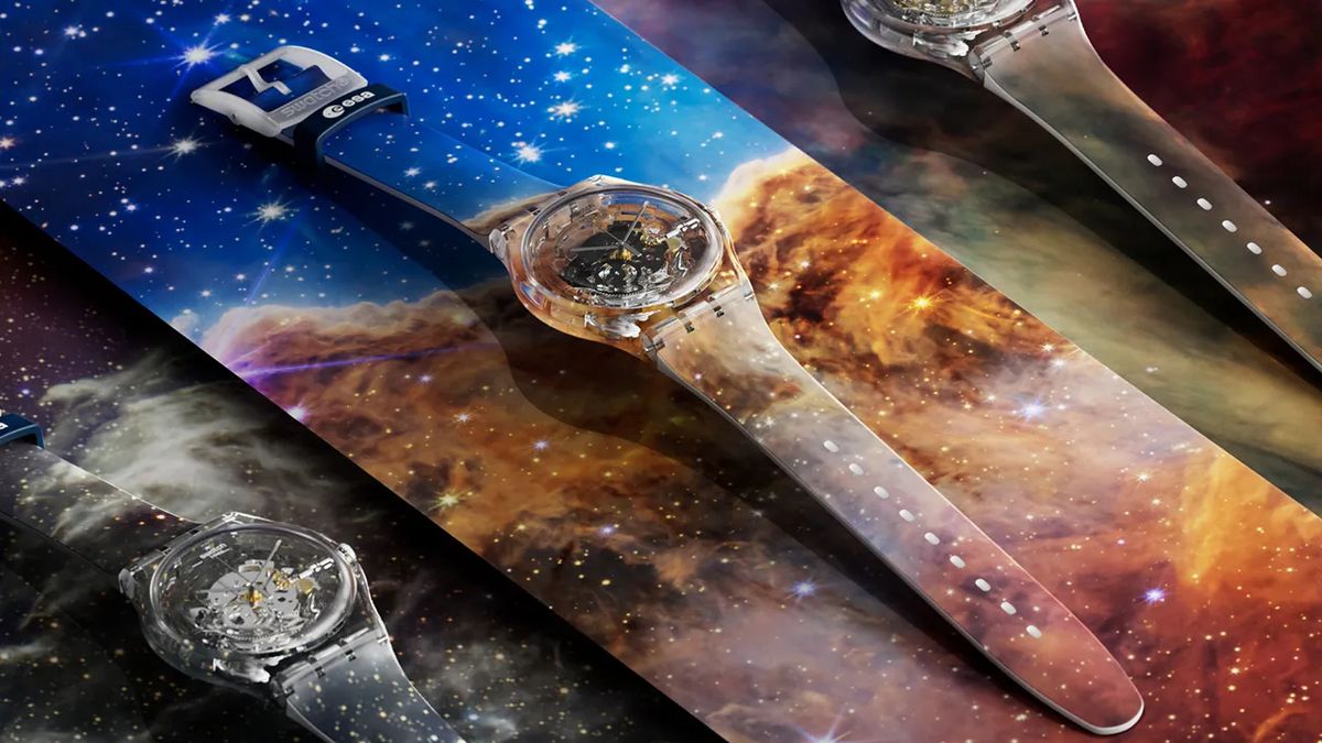 three different watches with stars and galaxies on them