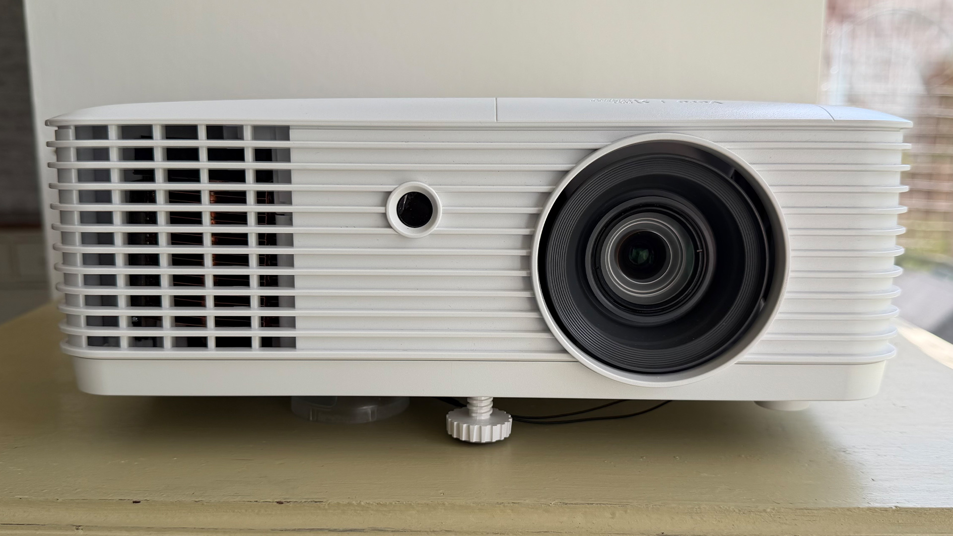 Acer Vero HL6810ATV home cinema projector on wooden furniture