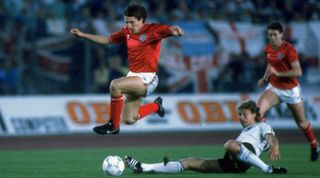 9 Sep 1987: Peter Beardsley of England is tackled by Guido Buchwald of West Germany during a match in Dusseldorf, West Germany. West Germany won the match 3-1. \ Mandatory Credit: David Cannon/Allsport