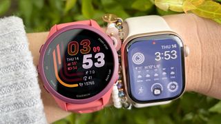 Garmin Forerunner 170 and Apple Watch 11 on the wrist