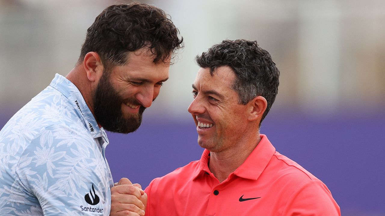 Jon Rahm and Rory McIlroy at the DP World Tour Championship