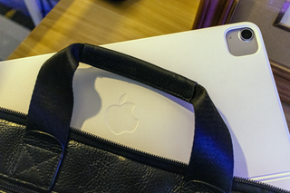 The iPad Air partly inserted in the author's bag