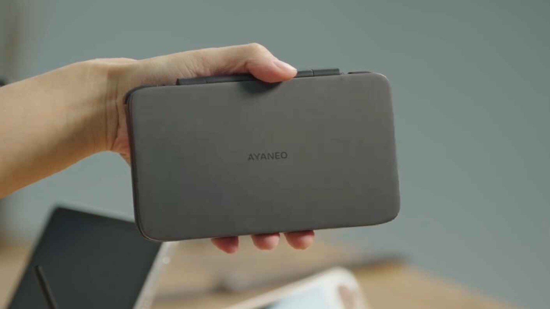 AYANEO Pocket DS in-hand with lid closed