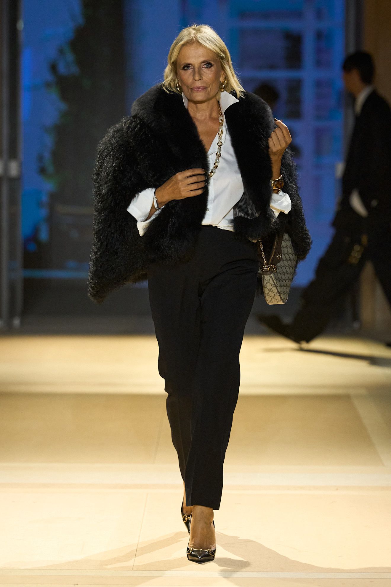 Models walking in Gucci's Spring 2027 runway show.