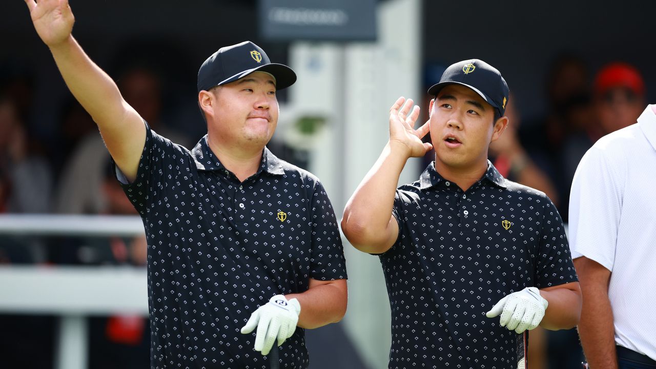 Sungjae Im of South Korea and Tom Kim of South Korea and the International Team acknowledge the crowd on the first tee during Thursday&#039;s Four-ball matches on day one of the 2024 Presidents Cup at The Royal Montreal Golf Club on September 26, 2024 in Montreal, Quebec, Canada.